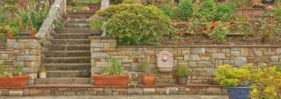 12 simple retaining wall ideas for a sloped backyard